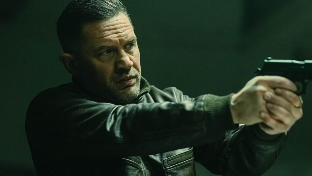 00AP-7 Moment rusty ex-Bond star Pierce Brosnan, 72, is given tips on how to hold a handgun while filming MobLand series 2